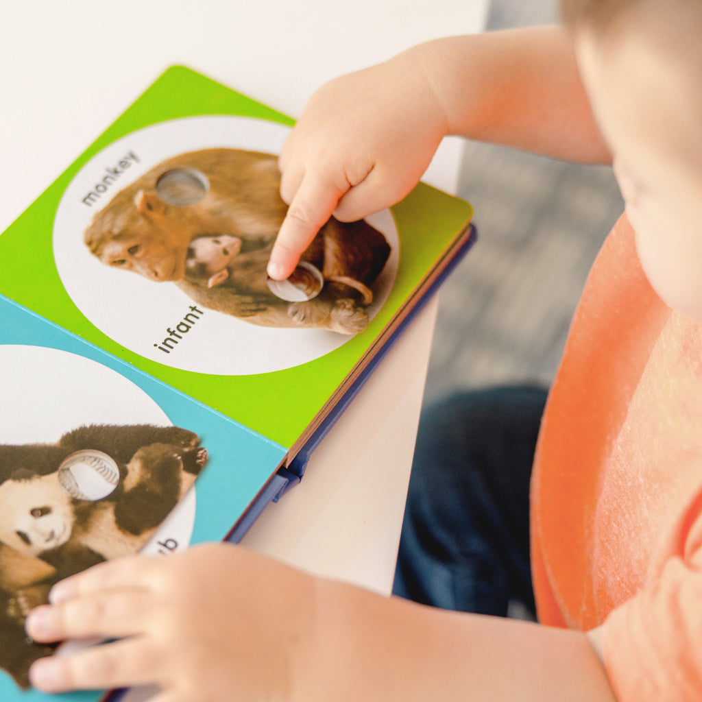 Educational Poke-a-Dot Wild Animal Families Board Book